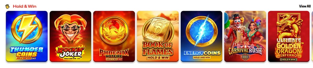 Hold & Win category row with game thumbnails for Thunder Coins, Rockin’ Joker, Phoenix Hotfire, Book of Flames (Hold & Win), Energy Coins (Hold & Win), Carnival Rush, and Ultimate Golden Dragon Inferno, plus a “View All” link on the right.